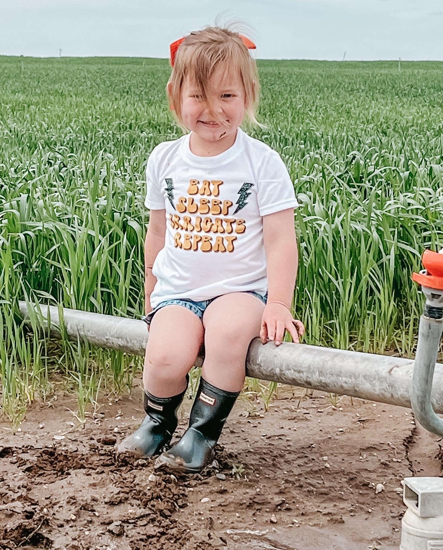 the Eat. Sleep. Irrigate. Repeat. onesie + tee